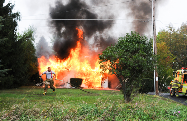 Update: Fire destroys garage, car