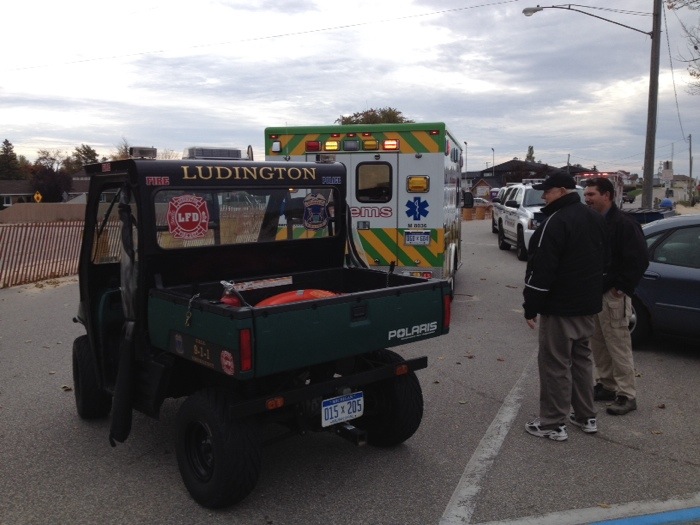 Woman saved after fall from breakwater