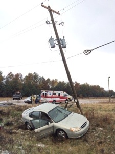 Car strikes power pole