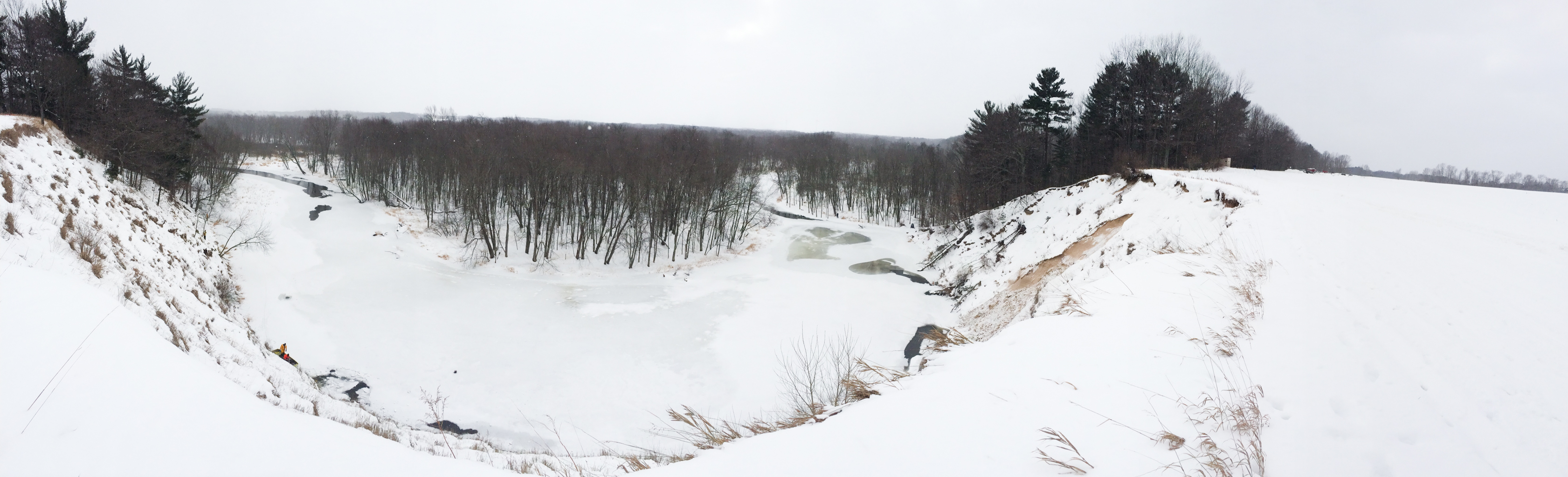Snowmobiler’s body recovered from river