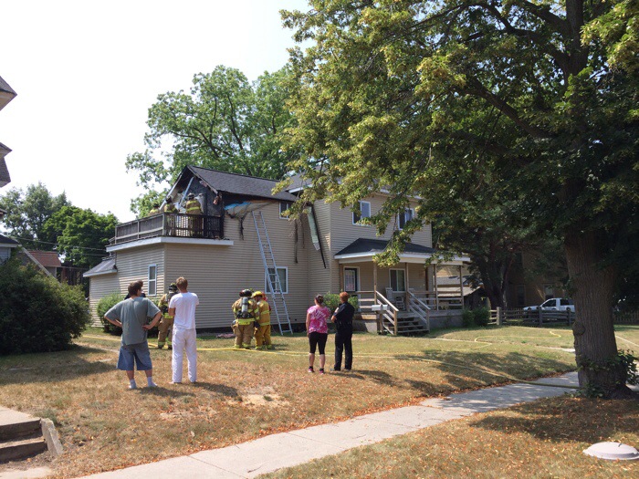 Tenant escapes apartment fire, uses garden hose to fight fire