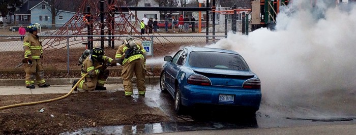 Fire destroys car near school.