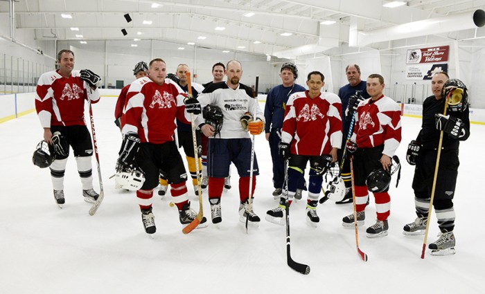 Cops and firefighters to face off in rematch hockey game.