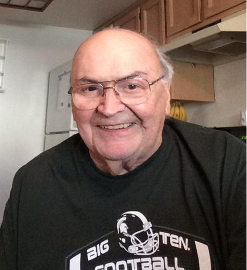 Gene, always wearing green.