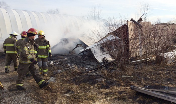 Unreported barn fire rekindles.