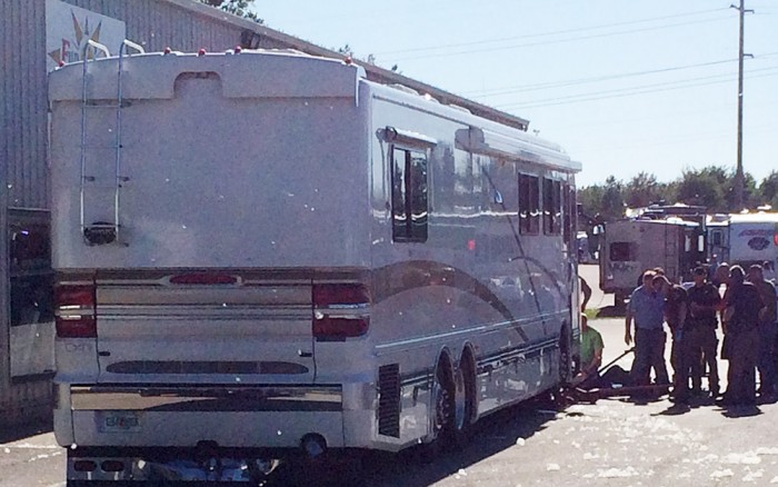 Man injured after RV falls on him.