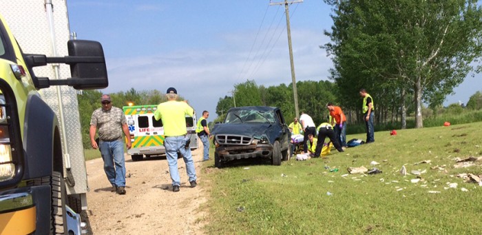 Woman injured after rollover crash.