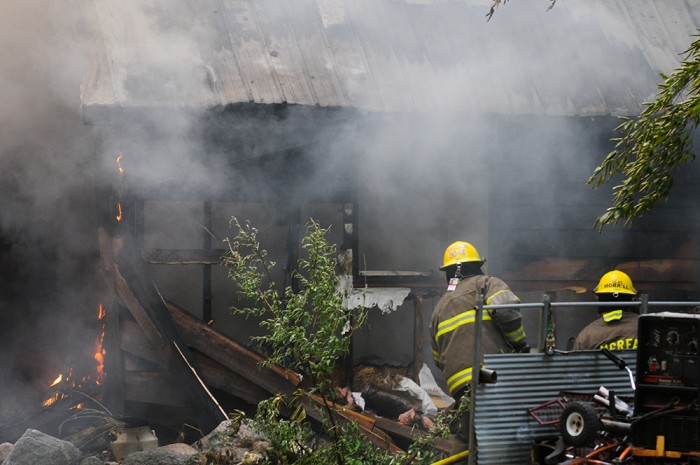 Historical Hopkins Lake home declared a loss after fire.