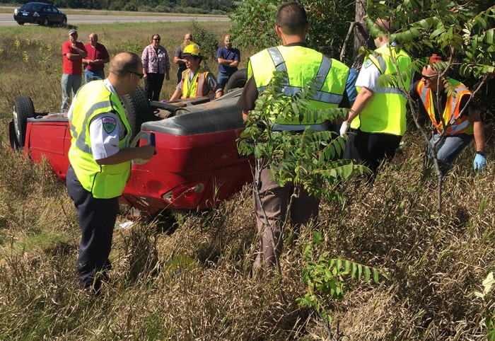 Sleeping driver causes expressway rollover.