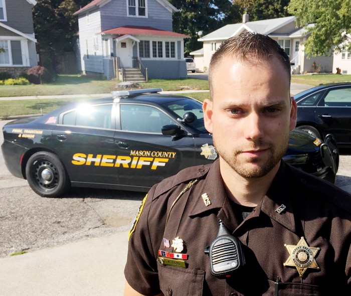 Deputies choose not to shave for Adopt A Door; campaign going well, sheriff says.