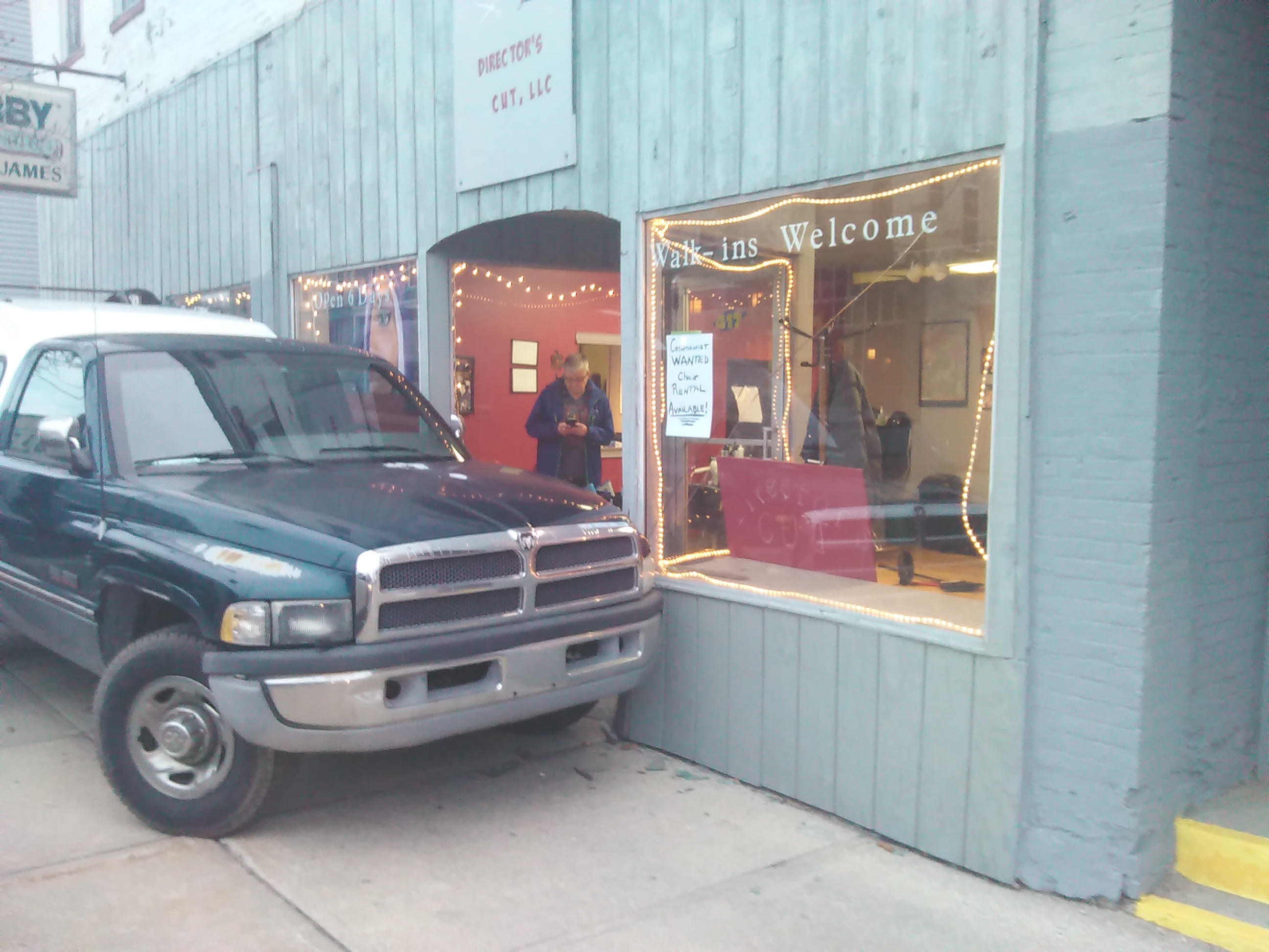 Truck runs into hair salon.