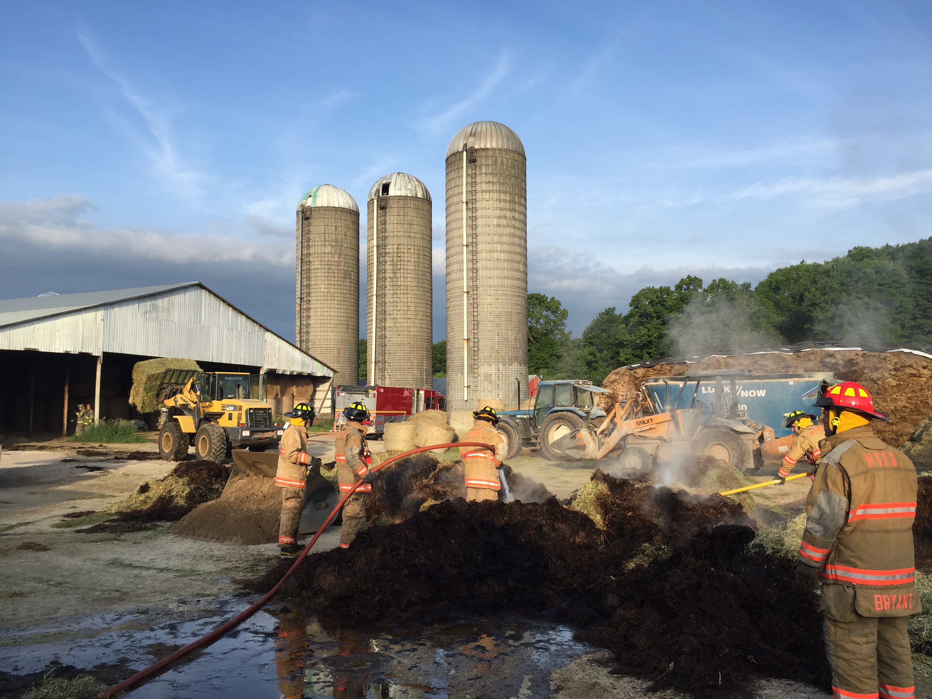 Quick action by farmer and fire department prevents barn fire.