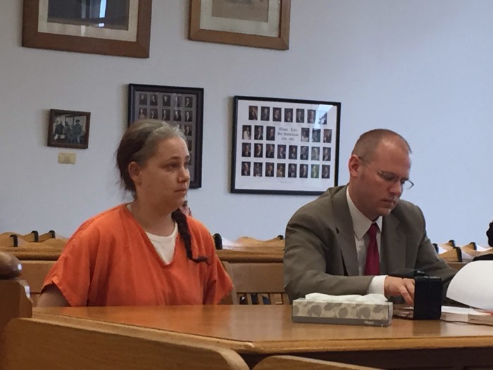 Scottville woman sentenced to jail for wielding axe.