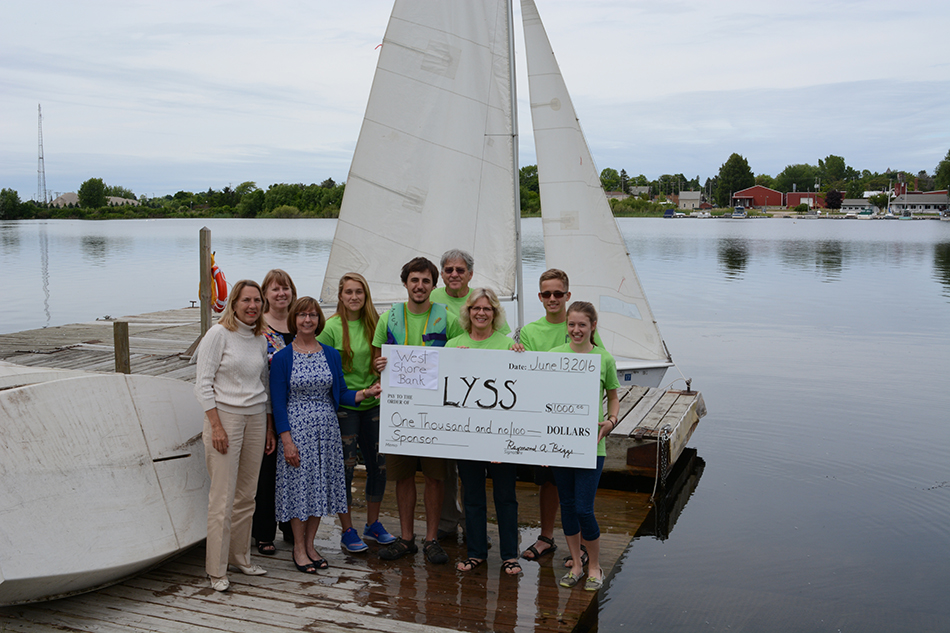West Shore Bank donates to sailing school.