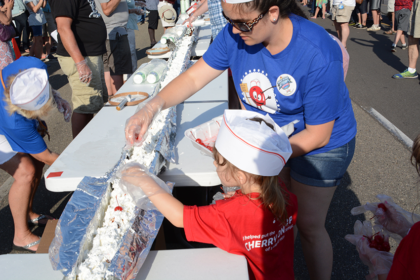 Thousands help with attempt for World’s Longest Ice Cream Dessert.