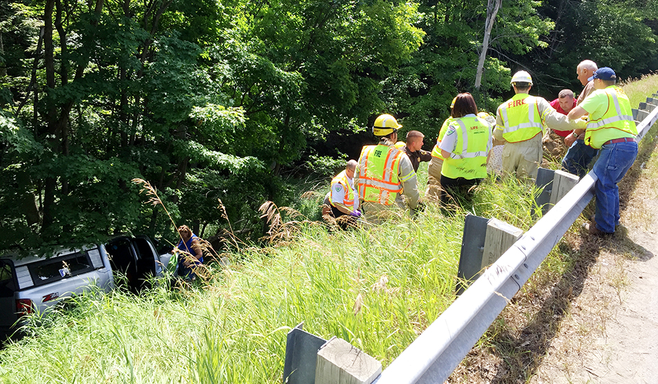 3 uninjured after vehicle crashes over US 10 embankment.