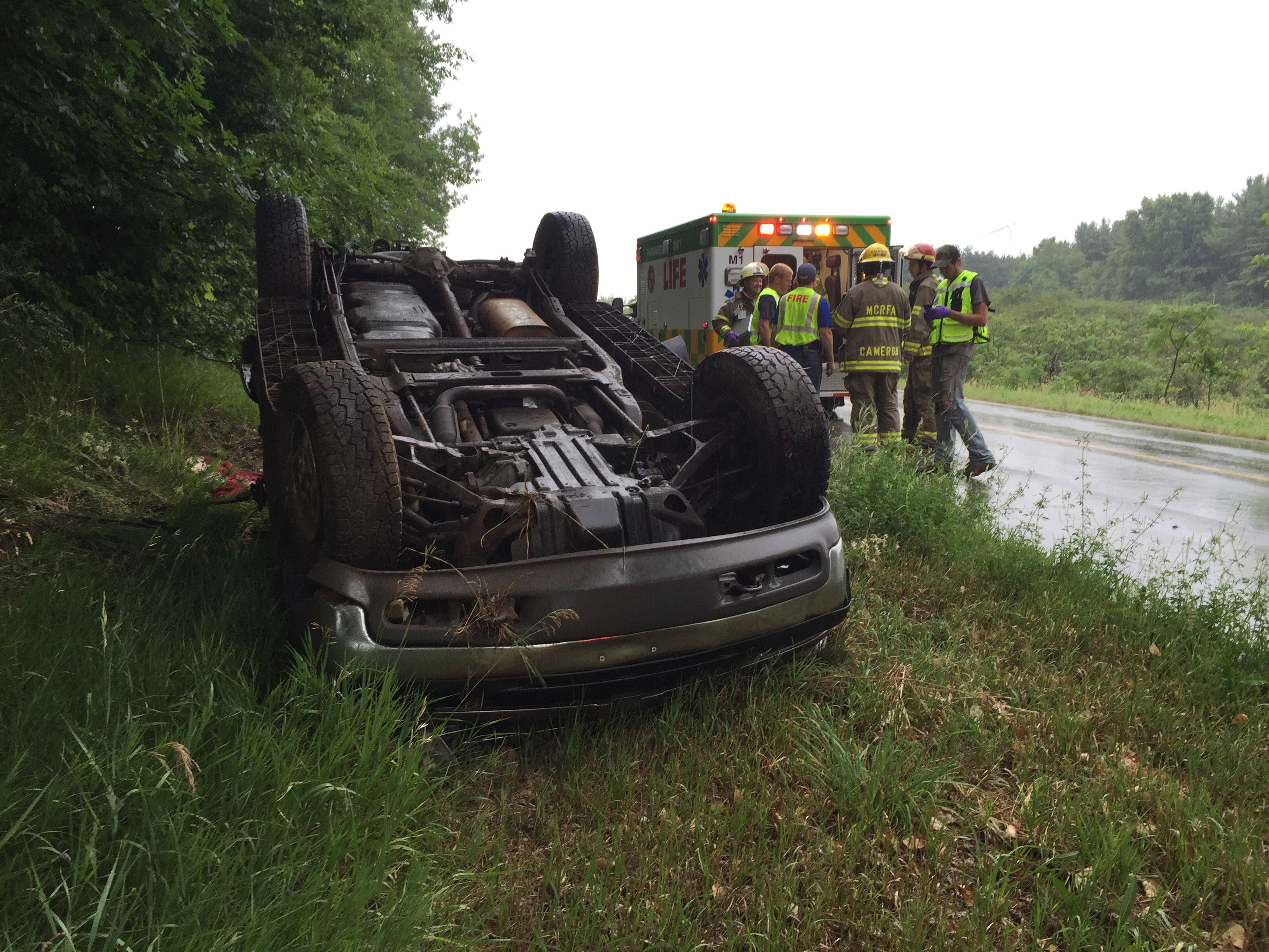 Driver receives minor injuries after rollover.