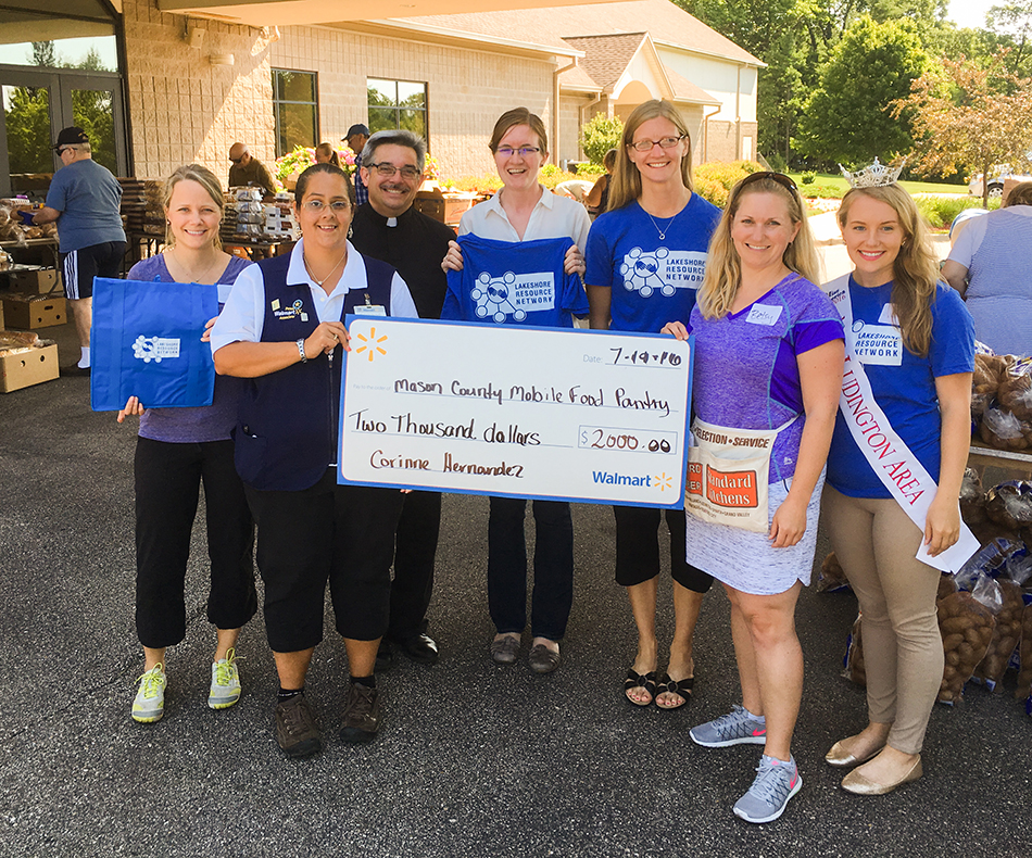 Wal-Mart grant helps offset food pantry costs.