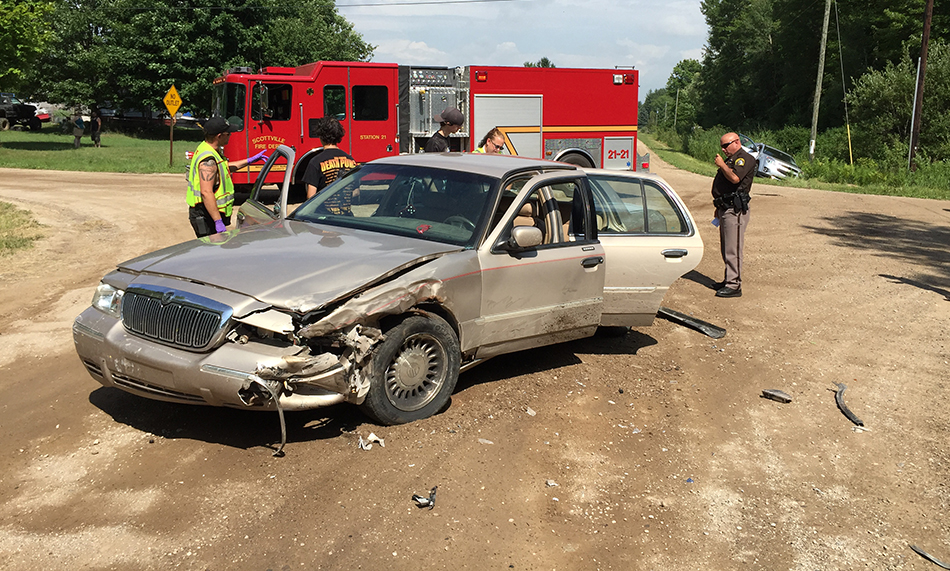 Driver receives minor injuries after struck by non-yielding car.