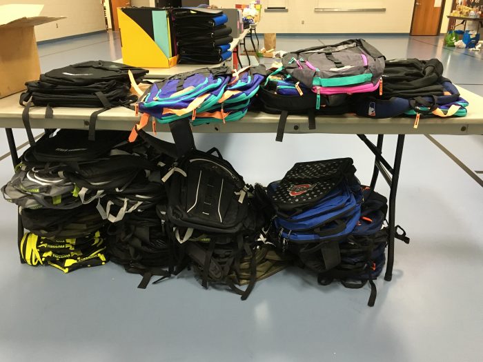 Lakeshore Resource Network donates 300 backpacks to area students.