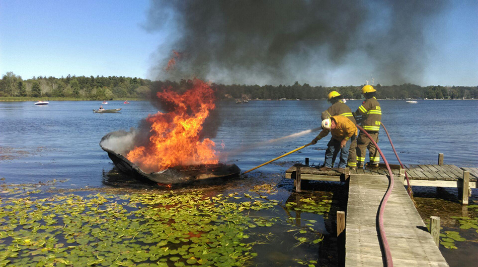 Fire destroys boat on Bass Lake, causes fuel spill.