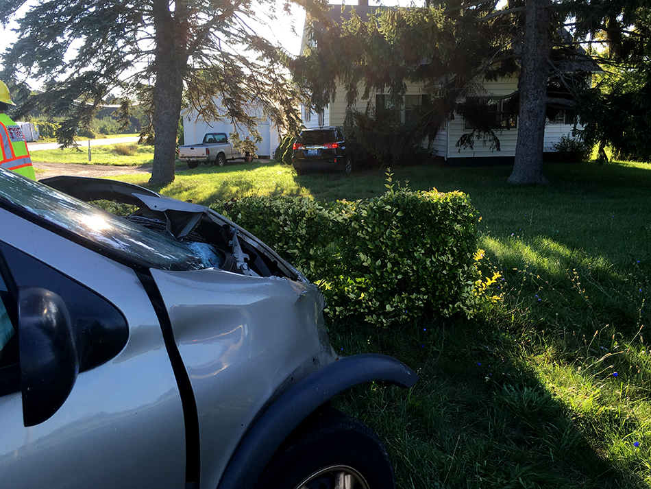 Vehicle strikes house following crash.