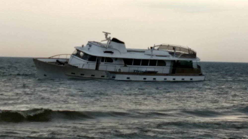 Coast Guard assists boater to shore after boat takes on water.