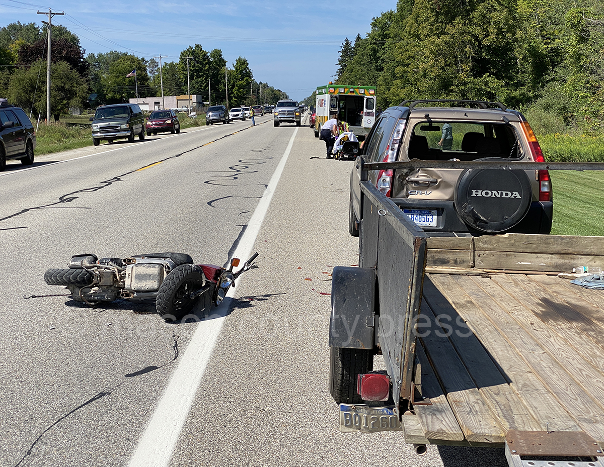 Scooter driver injured following US 10 crash.