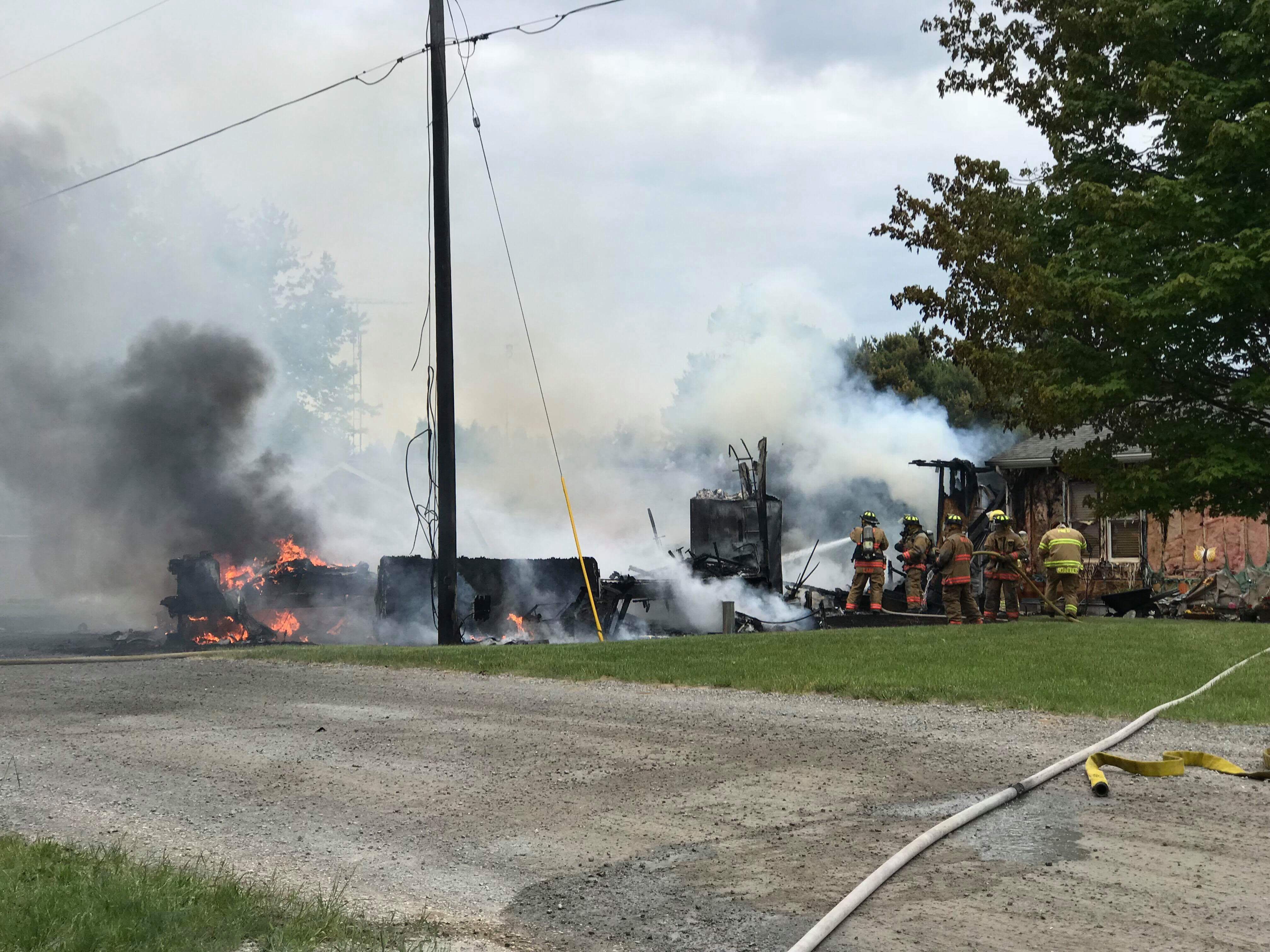 Fire destroys Hamlin garage, damages home