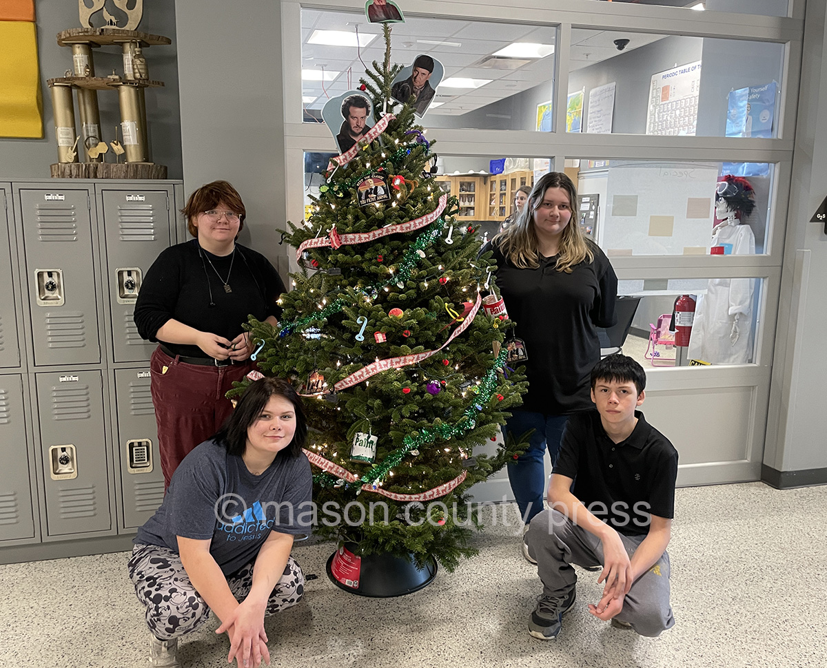 G2S students selling Christmas trees for charitable causes